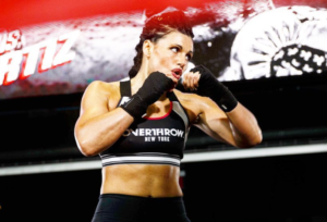 female New York boxer in boxing ring